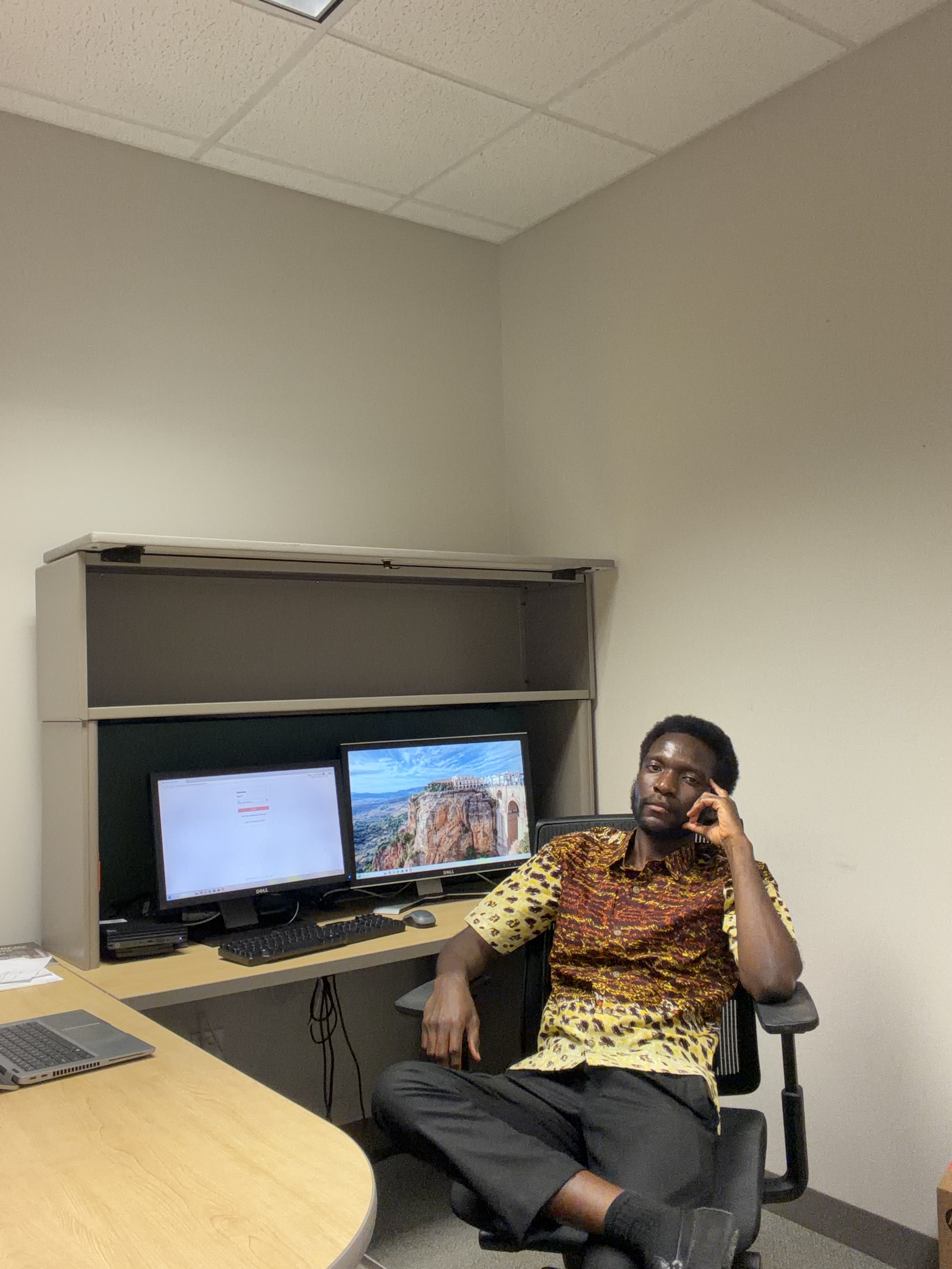 Dr. Jeffery Opoku in a research office environment